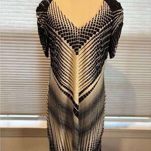 Easy care dress with strategic flattering design